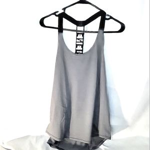 NWT women's yoga/workout tank. Size large. Available in white, black or gray